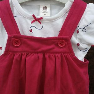 red and white dungree style frock.for newborn girls. wore only once. recently purchased