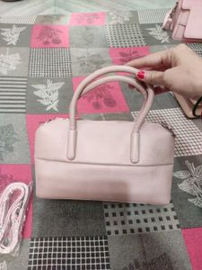 Chic Pink Handbag with Scarf Accent