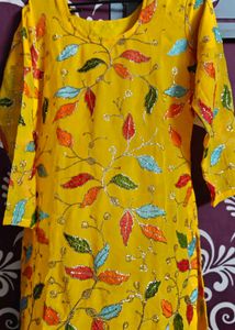 Vibrant Kurta Set with Floral Embellishments
