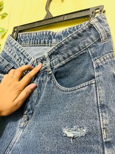 Distressed Blue Denim Jeans