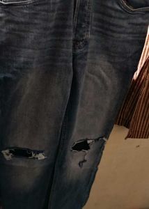 Ripped Knee Denim Jeans