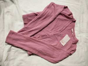 Ribbed Pink Knit Cardigan with White Dress