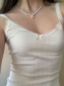 white H&amp;M trimmed top