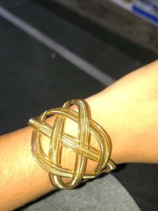 Elegant Gold Tone Knot Bracelet