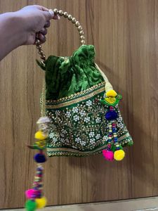 Embroidered Potli Bag both for 399
