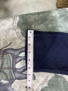 Combo of green shirt and denim jeans