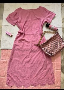 Chic Pink Midi Dress with Cutout Hem