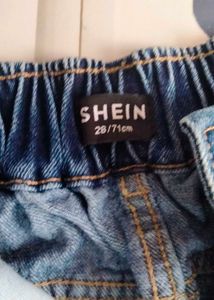 Blue Wide Leg Jeans with Bow Detail