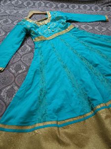 Beautiful Turquoise Kurta Set with Gold Border
