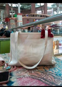 Chic Cream Tote Bag with Red Bow Accent
