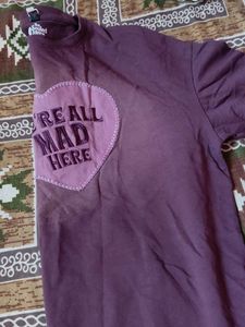 Purple "We're All Mad Here" Graphic Tee
