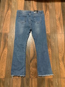Flared Denim Jeans with Raw Hem