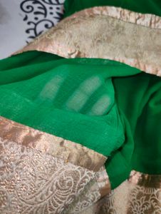 Elegant Emerald Green Saree with Gold Border