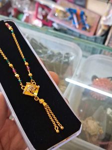 Elegant Gold Necklace with Emerald &amp; Ruby Accents