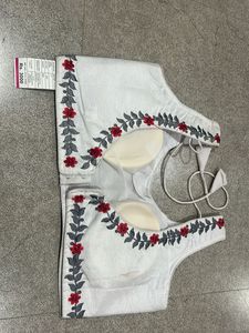 Embroidered White Sleeveless Blouse