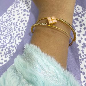 Elegant Gold-Tone Bangle with Gemstones