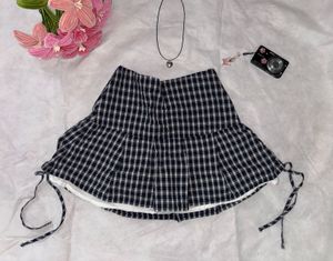 Plaid Pleated Mini Skirt with typing bow