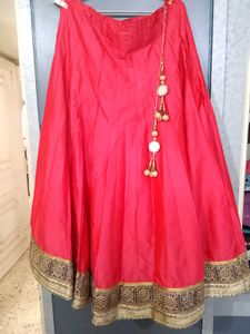 Red lehanga with stunning golden border