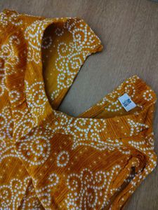 Mustard Yellow Printed Sleeveless Kurti