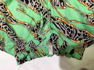 Green Cheetah Print peplum top fits S-M