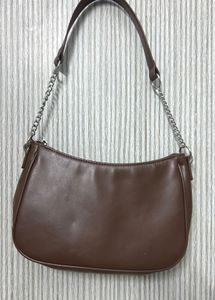 Chic Brown Shoulder Bag with Chain Accent