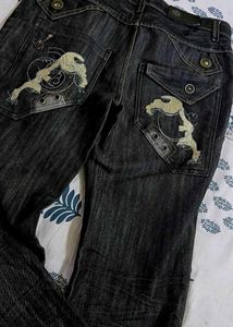 Dark grey y2k jeans.