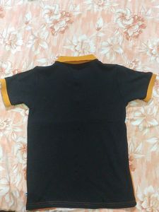 Black &amp; Orange Color Block Polo Shirt