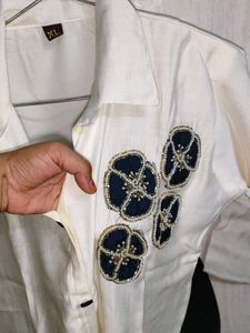 Elegant White Kurta with Blue Embellishments