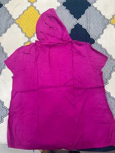 pink sleeveless shirt with cap