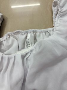 white crop pouf sleeve top