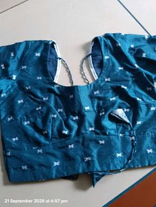 Elegant Teal Saree with Intricate Designs