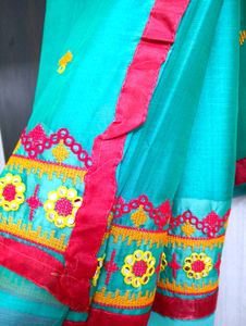 Beautiful Teal Saree with Pink Border
