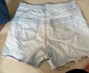 Distressed Light Wash Denim Shorts