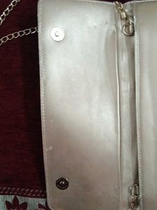 Elegant Gold Clutch with Chain