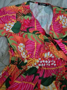 Vibrant Floral Wrap Romper
