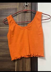 Vibrant Orange Ribbed Lettuce Hem Top