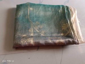 Beautiful Teal Saree with Golden Print