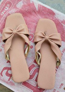 Women's Peach Flats With Bow Detail