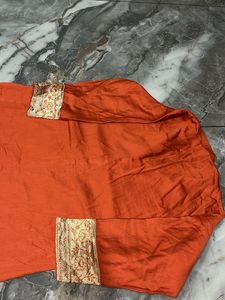 Orange Embroidered Kurta and skirt