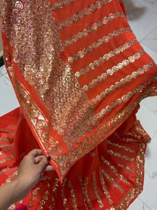 Vibrant Orange Sequined Saree