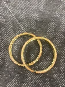 Elegant Gold and Peach Bangles