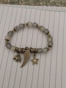 Unique Beaded Bracelet with Charms