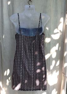 371110. Chic Black &amp; White Print Mini Dress
