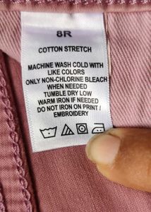 Cotton pant with slit at knee.