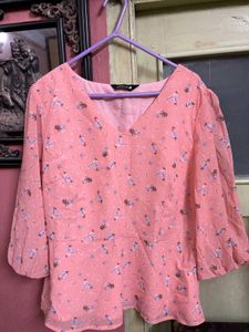 Chic Peach Floral Peplum Top