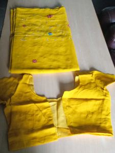 Vibrant Yellow saree with blowse  Embellishments
