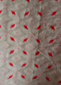 Elegant White Saree with Red Motifs