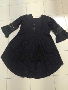 Elegant Black Kurta with Pink dhoti salwar.
