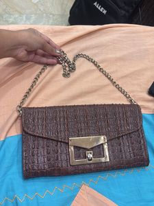 Elegant Brown Textured Clutch Bag