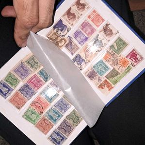 Vintage Stamp Album with 200+ stamps